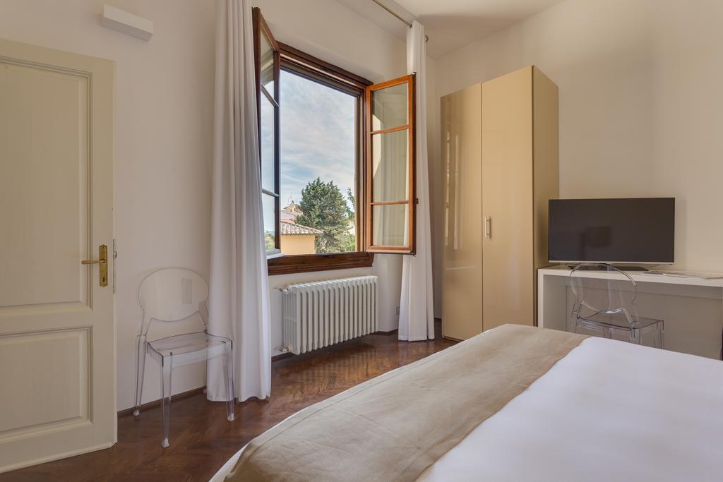 Апартаменти Palazzo Tempi Сан-Кашіано-ін-Валь-ді-Пеза Номер фото